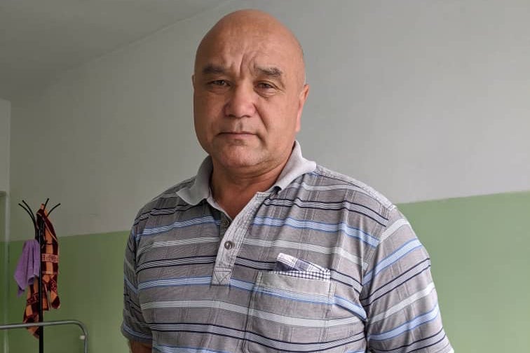 Kamil Ruziev stands in the hospital where he is getting treatment for high blood pressure after two days in the custody of the Kyrgyz national security services.