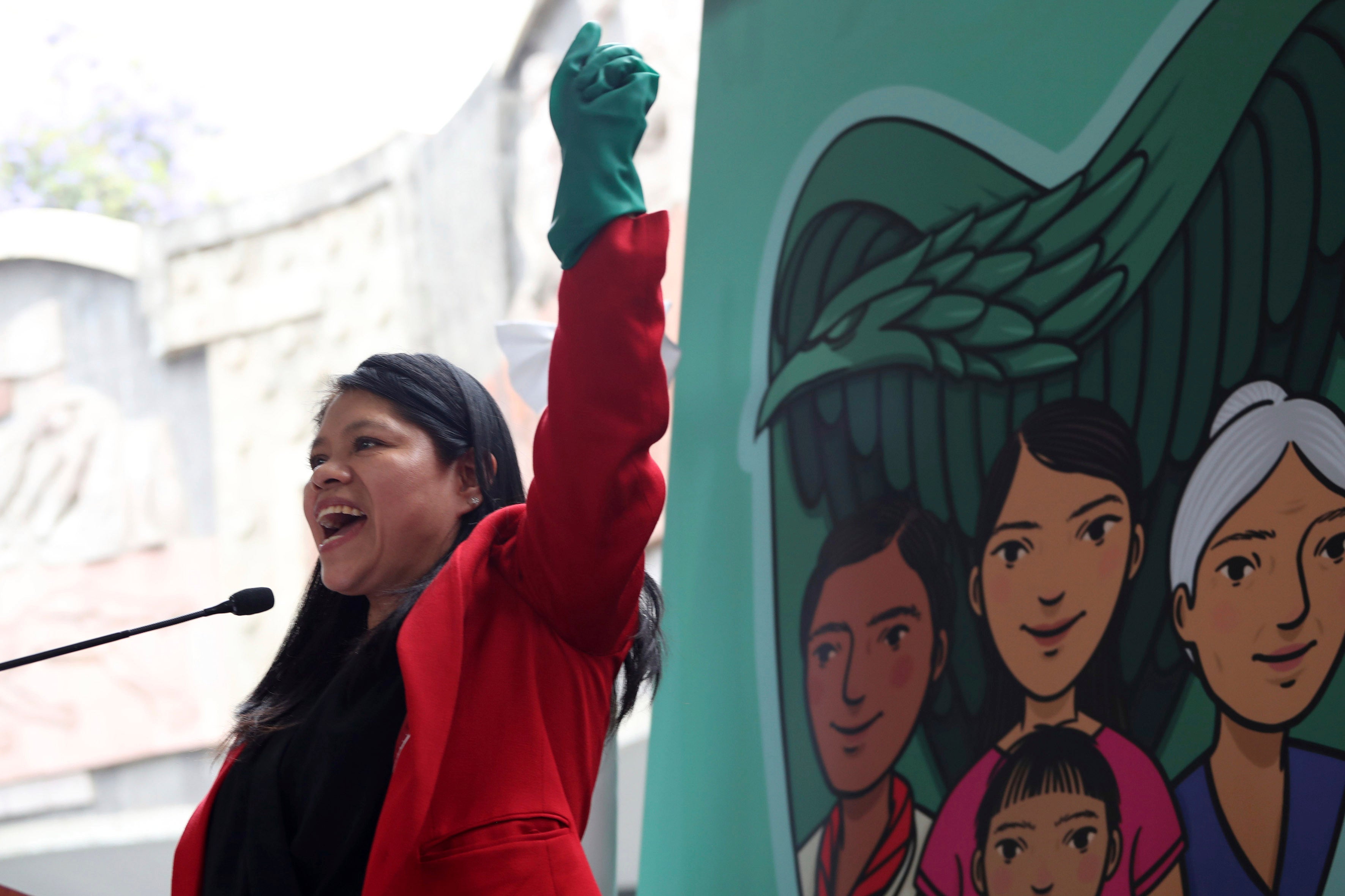 Marcelina Bautista, leader of Centro de Apoyo y Capacitación para Empleadas del Hogar, a domestic workers organization, celebrates the beginning of a pilot program extending access to social security and healthcare benefits for domestic workers, Mexico City, Mexico. 