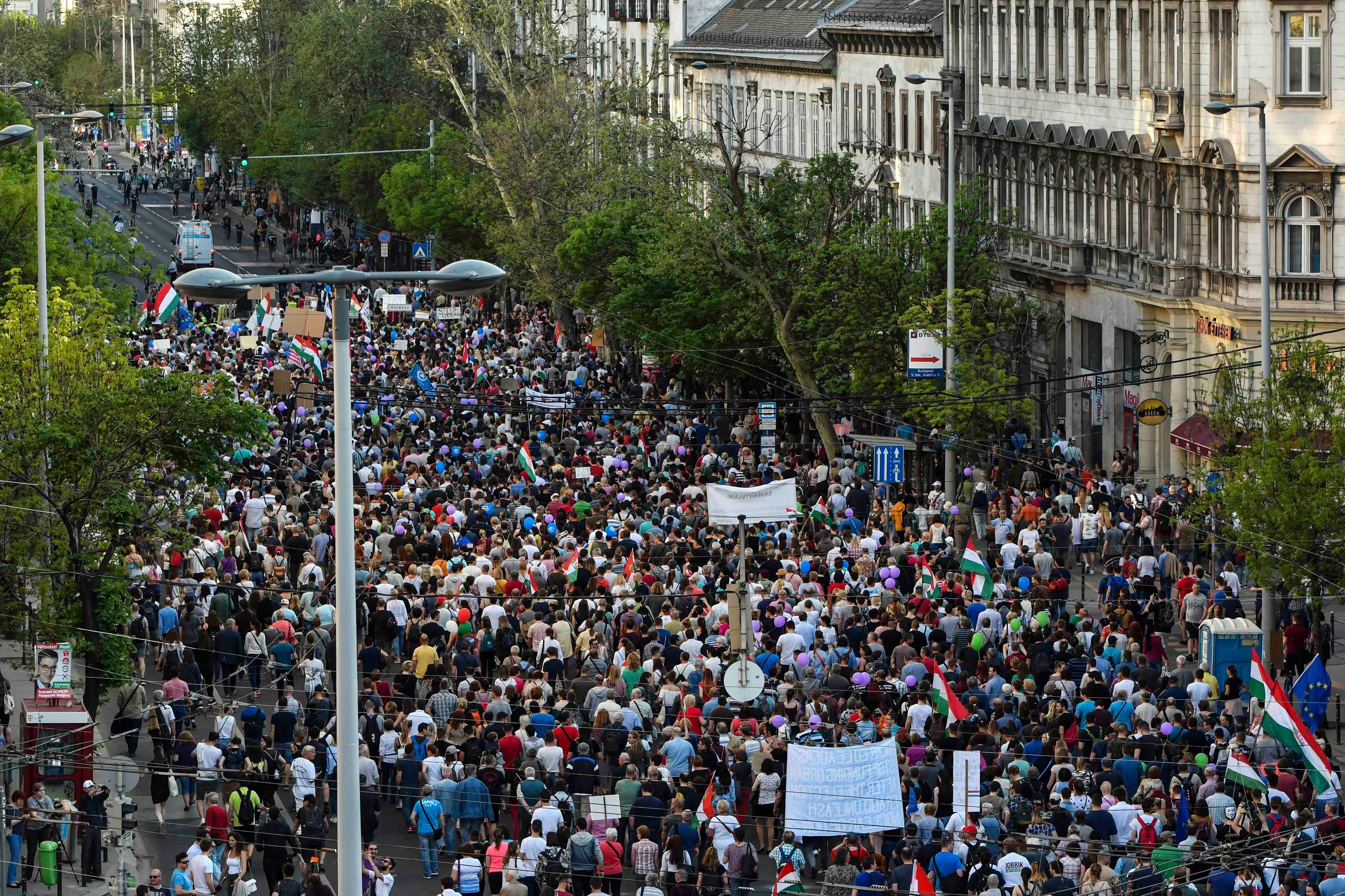 Thousands of people take part in a rally against the Hungarian government's distorting media policies and campaign against civic groups.