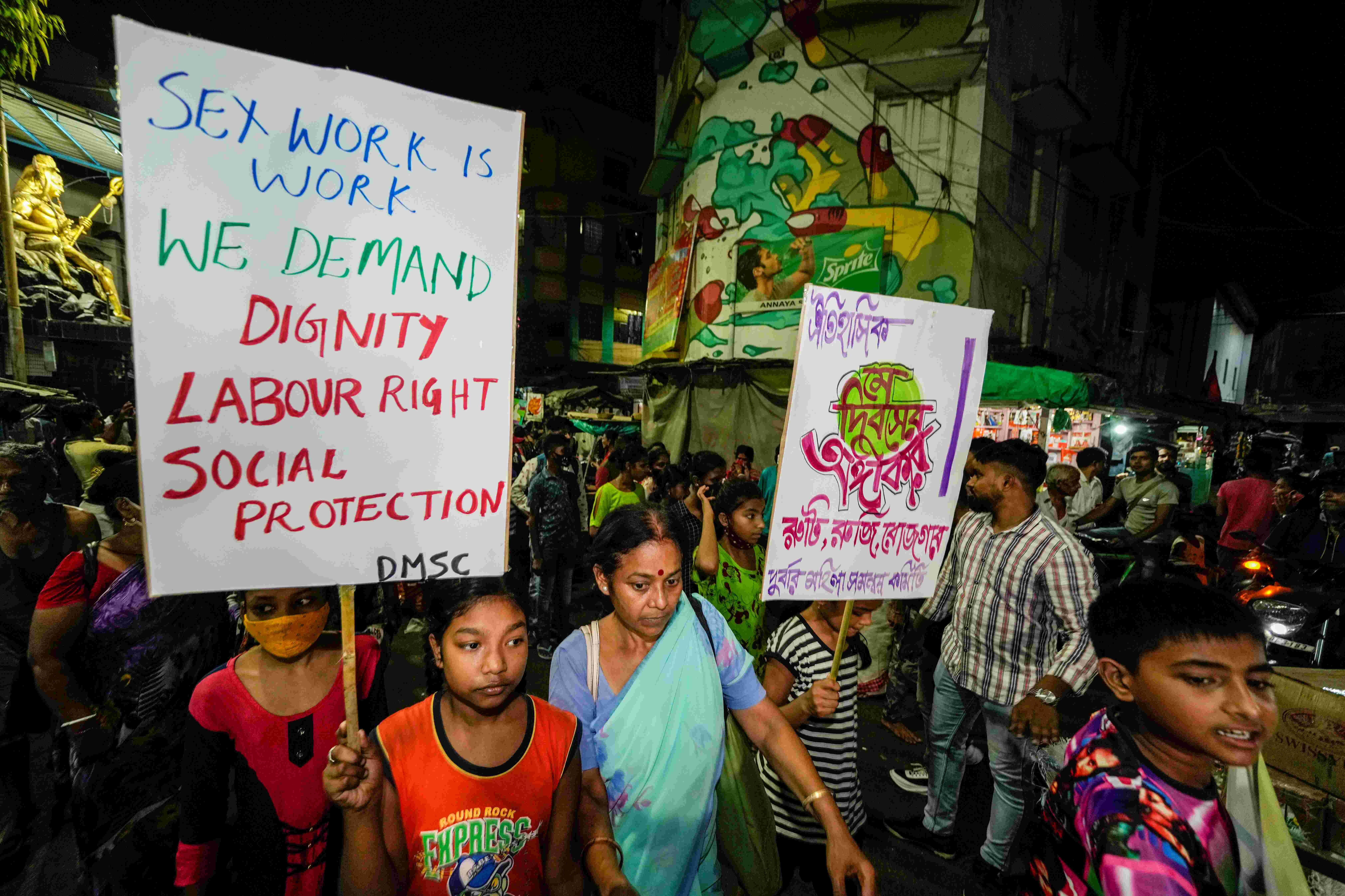 Sex workers and allies at a rally demanding sex work be recognized as work