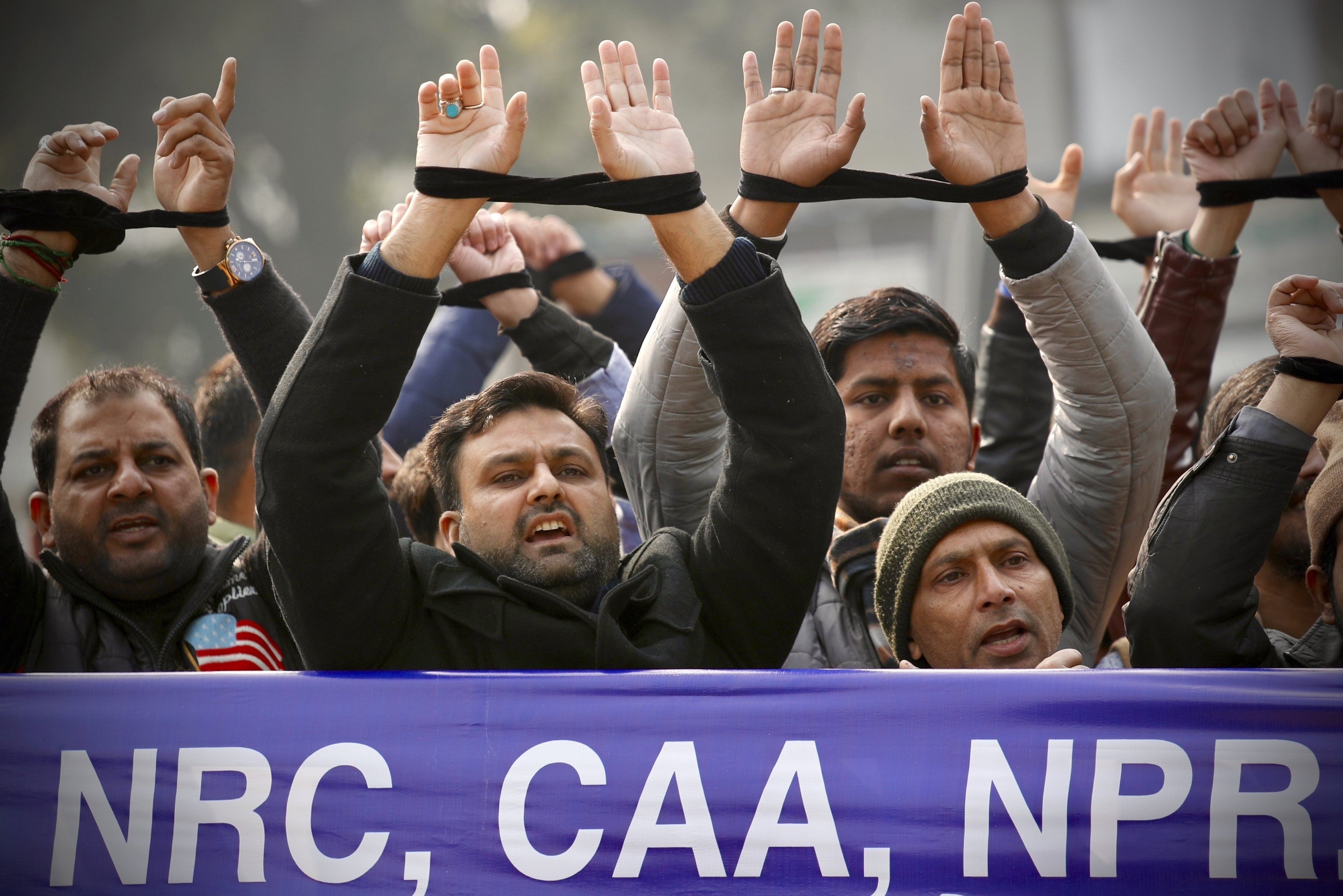 Protesters demonstrate against the Citizenship Amendment Act in New Delhi, India