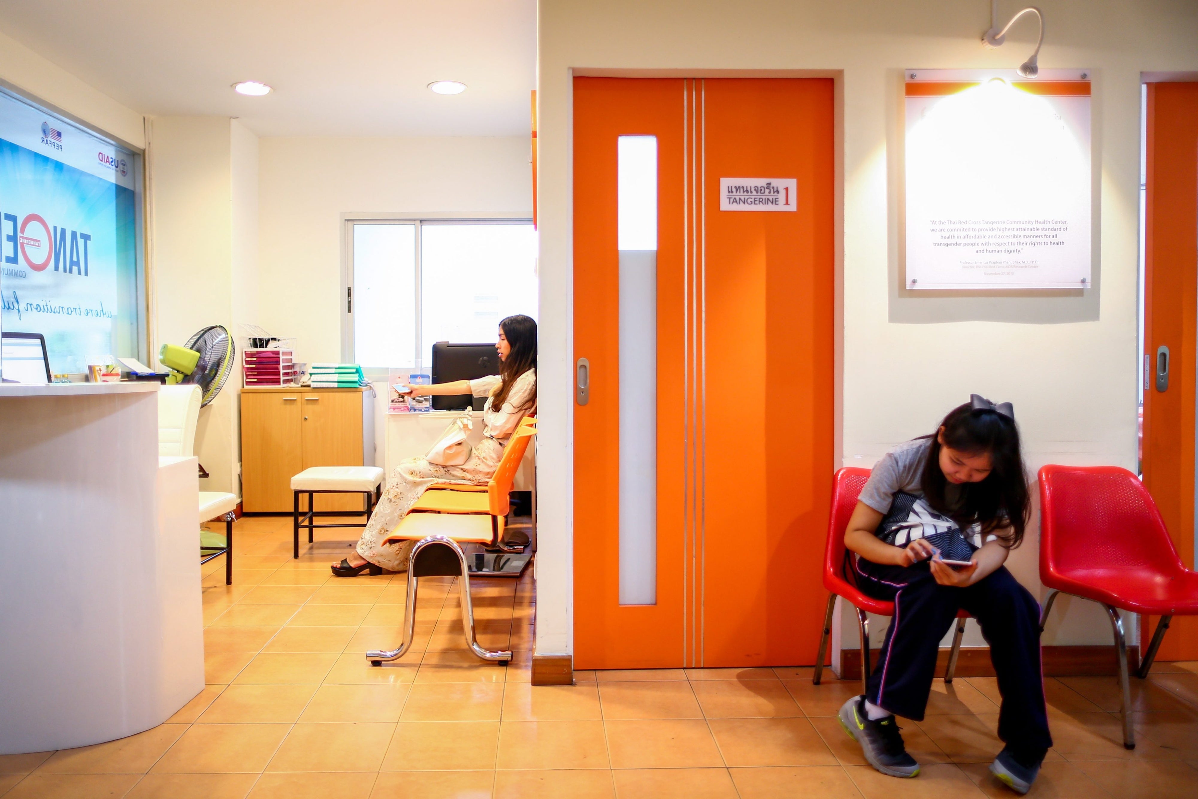 Patients wait at the Tangerine Clinic, a community health center with gender affirming care, in Bangkok, Thailand, June 21, 2016.
