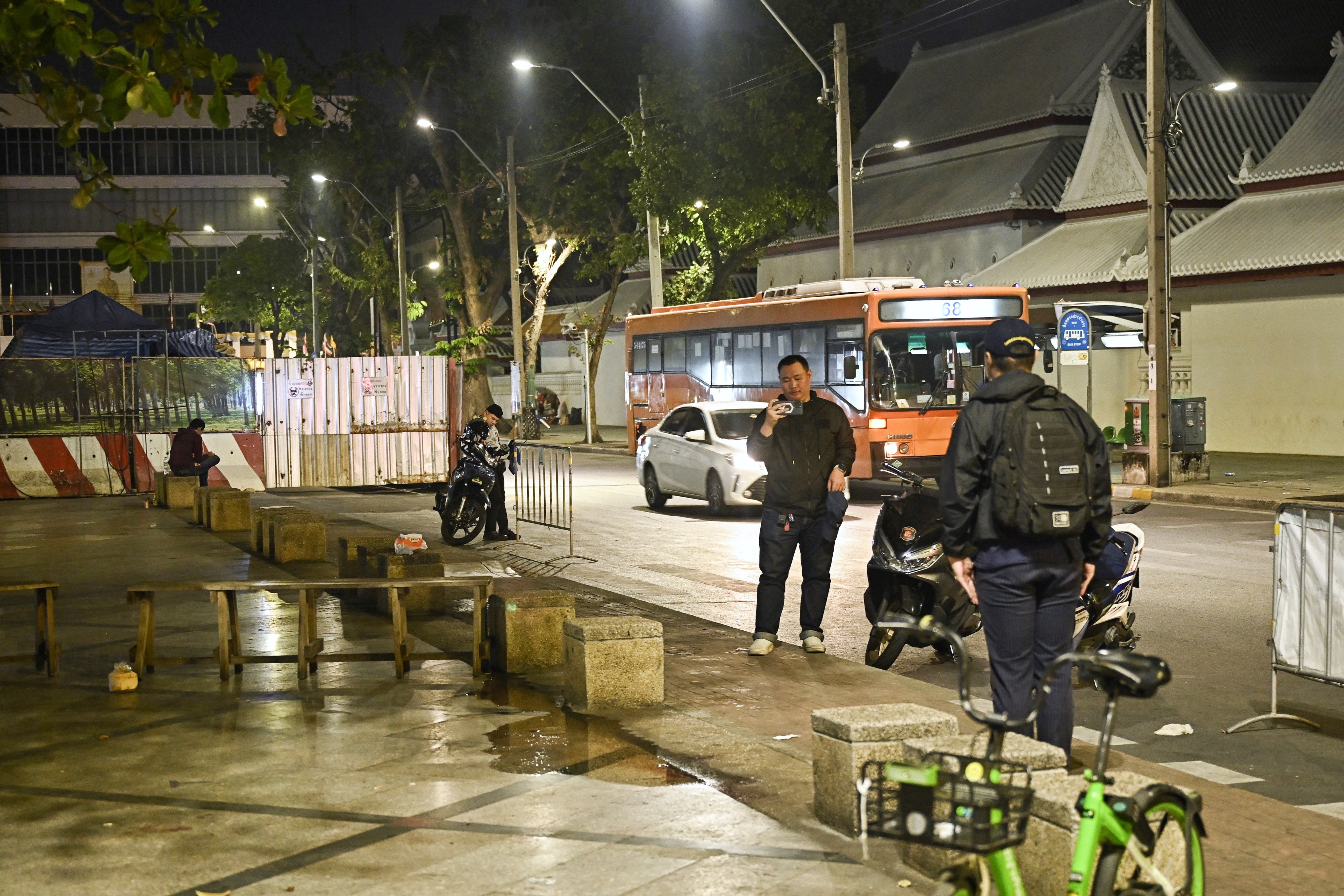 Thai Central Investigation Bureau members stand near the spot where Lim Kimya, a former member of the Cambodian parliament, was shot and killed, in Bangkok, Thailand, on January 7, 2025.