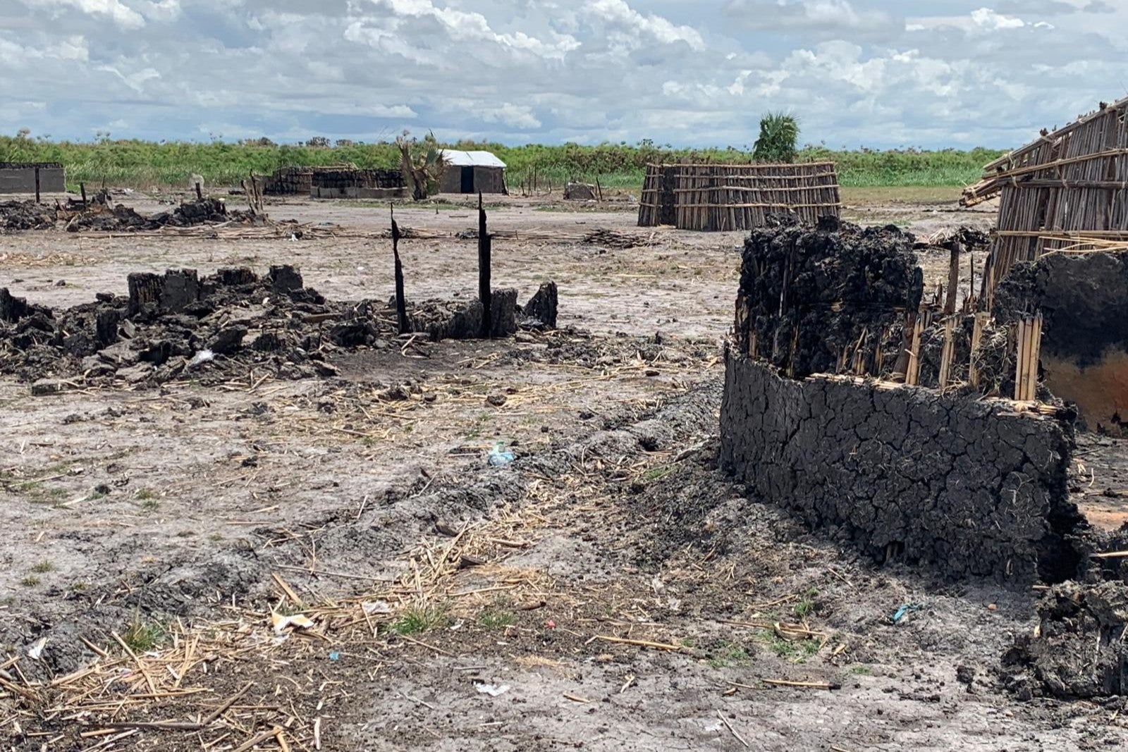 The remains of burnt homes in the town of Adok in Leer county, South Sudan. Photo taken in May 2022.