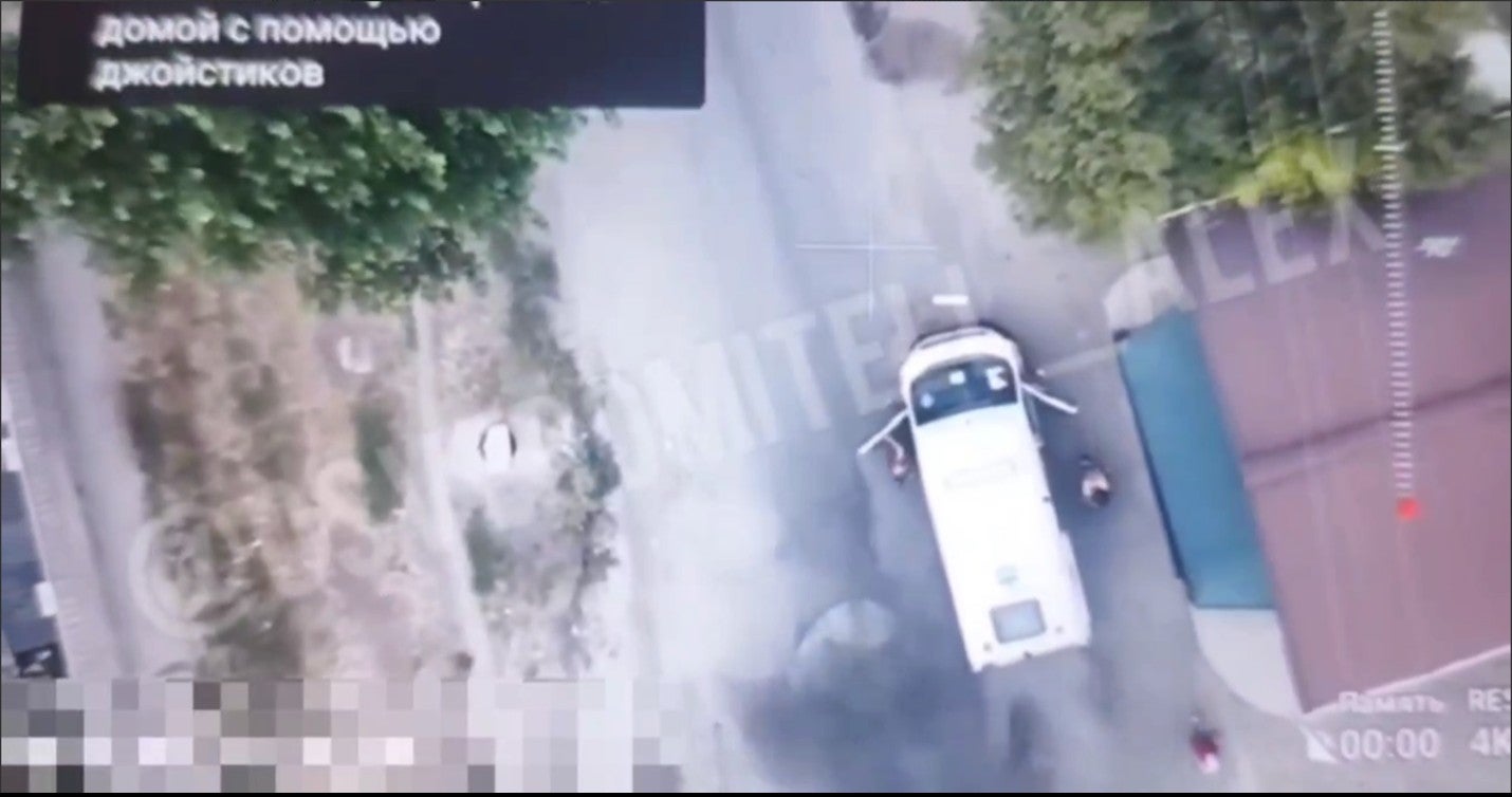 Screengrab of a drone video showing an ambulance