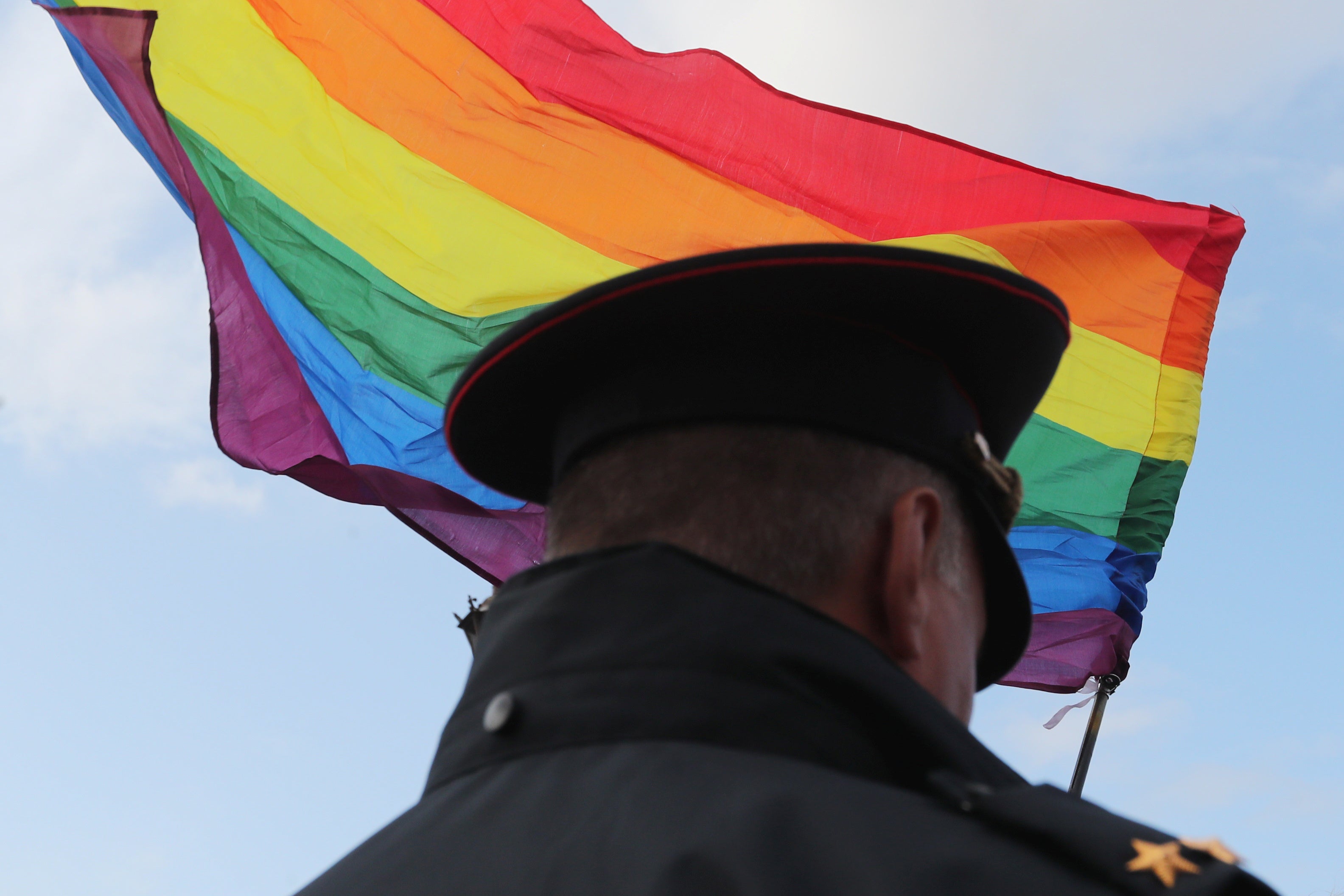 A law enforcement officer stands guard during the LGBT community rally "X St.Petersburg Pride" in Saint Petersburg, Russia, August 3, 2019. 
