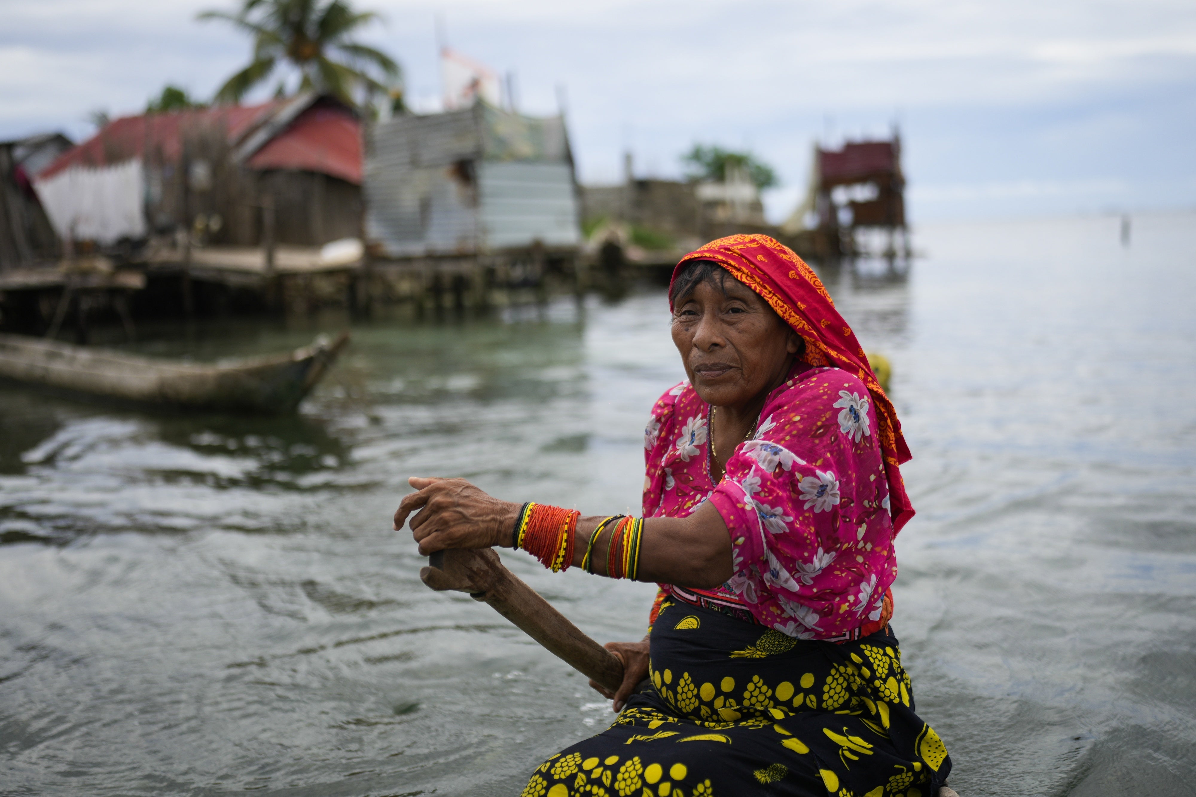 A person from the Guna Indigenous community along the shore of Gardi Sugdub Island, off Panama's Caribbean coast.