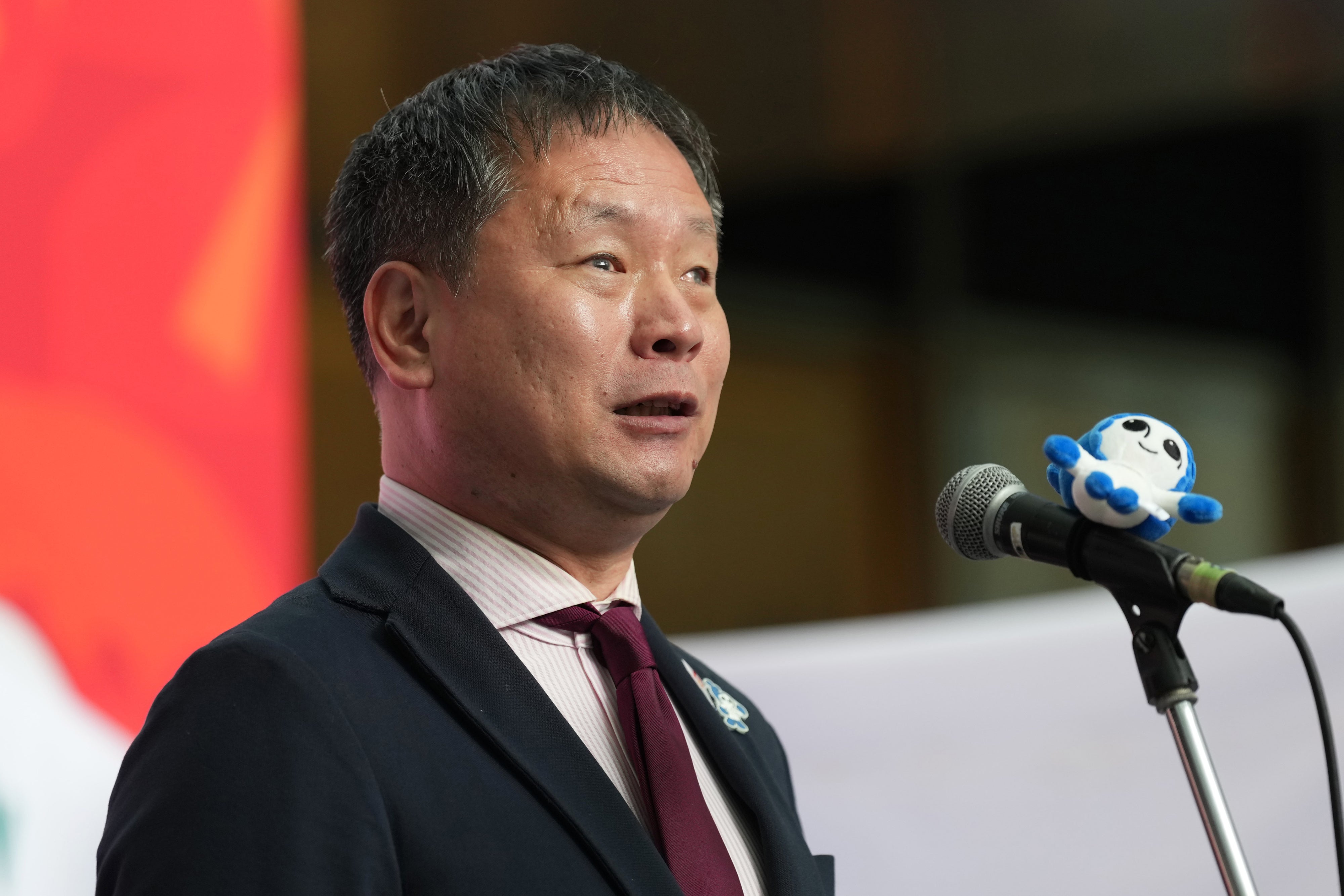 Junichi Kawai, the commissioner of the Japan Sports Agency, delivers a speech in Nagoya, Japan, October 18, 2025. 