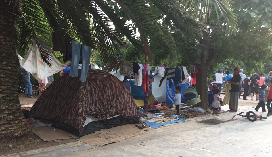 A makeshift camp at Pedion tou Areos, a park in downtown Athens where hundreds of migrants and asylum seekers, including families with children, are living rough. An estimated 50,000 people arrived on Greece's shores in July alone. 