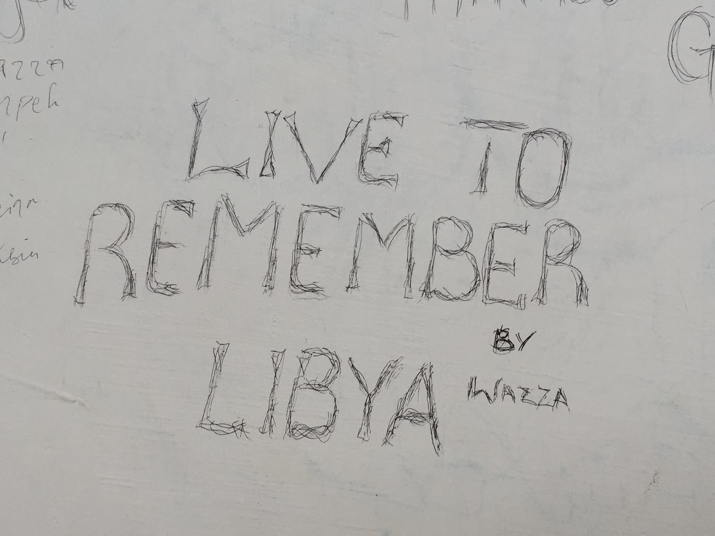 Graffiti by migrants at the Pozzallo reception center on Sicily, Italy.