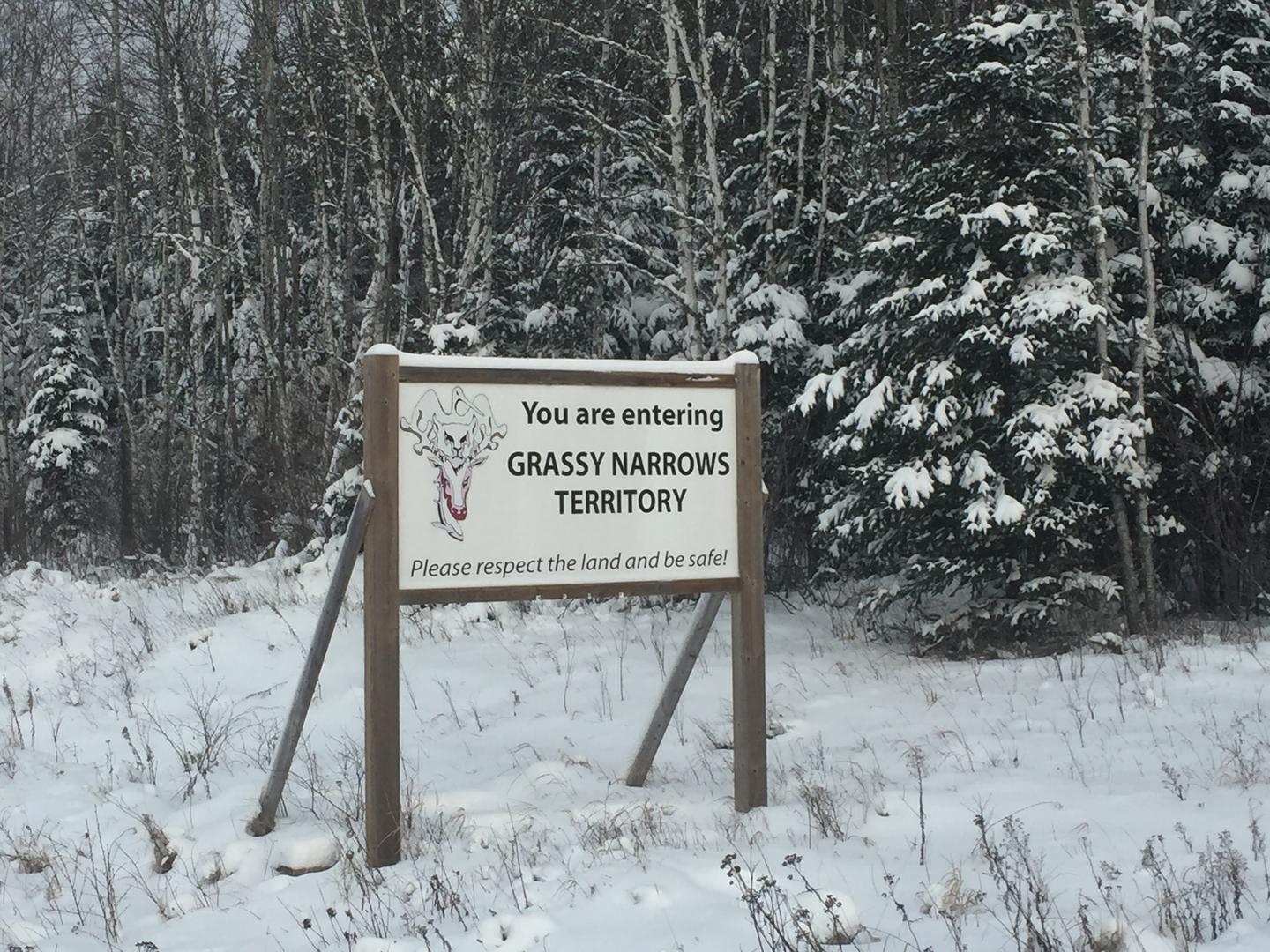 Sign entering Grassy Narrows, Ontario, Canada.