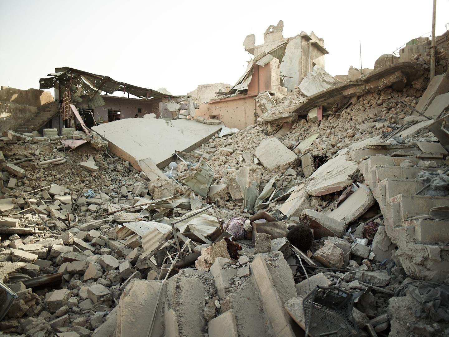 The body of an alleged ISIS fighter with his hands bound behind his back, executed in Mosul’s Old City by Iraqi soldiers identified as from the army’s 16th Division. 