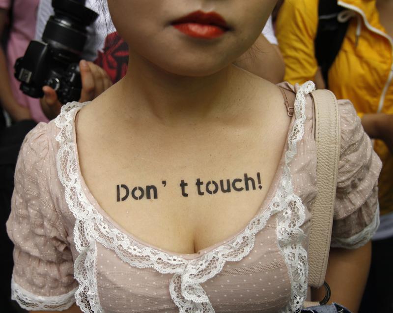A woman takes part in a SlutWalk protest, in central Seoul July 16, 2011.