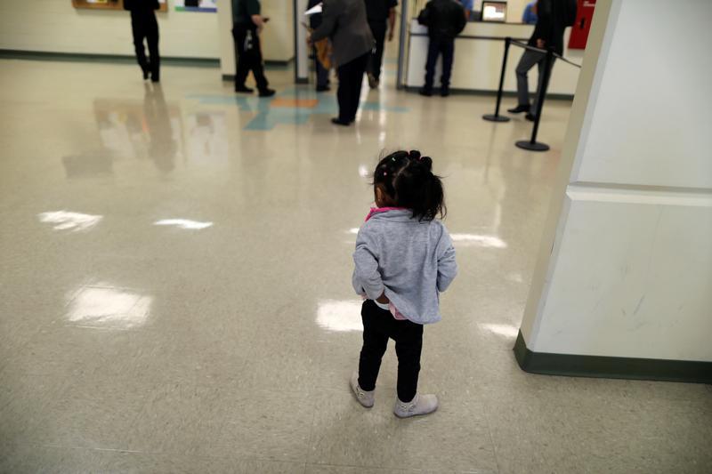 A girl stands in the lobby of the Adelanto immigration detention center, in Adelanto, California, U.S., April 13, 2017.