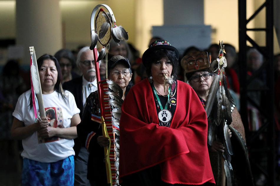 Women march in during the closing ceremony of the National Inquiry into Missing and Murdered Indigenous Women and Girls in Gatineau, Quebec, Canada, June 3, 2019. 