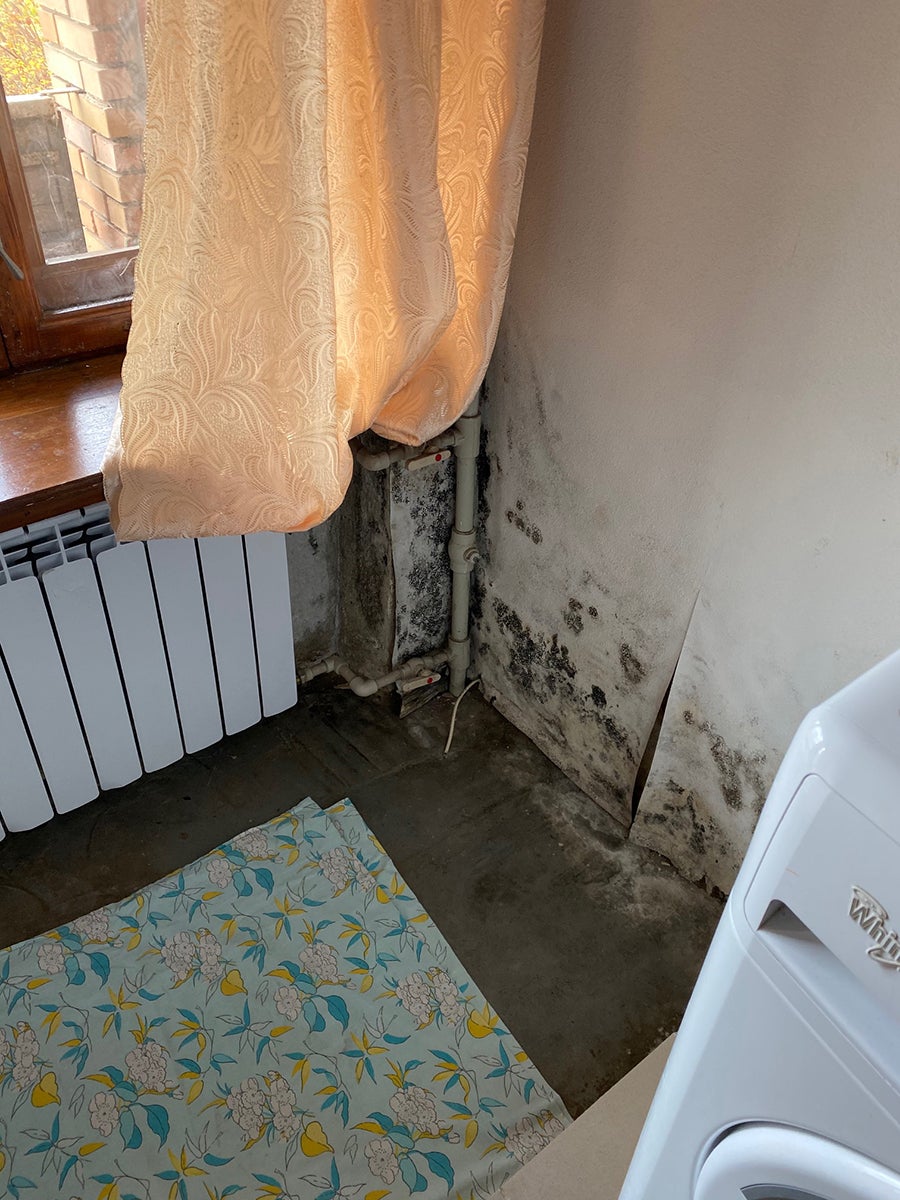 Common laundry room next to the shower area at Sviati Hory. 