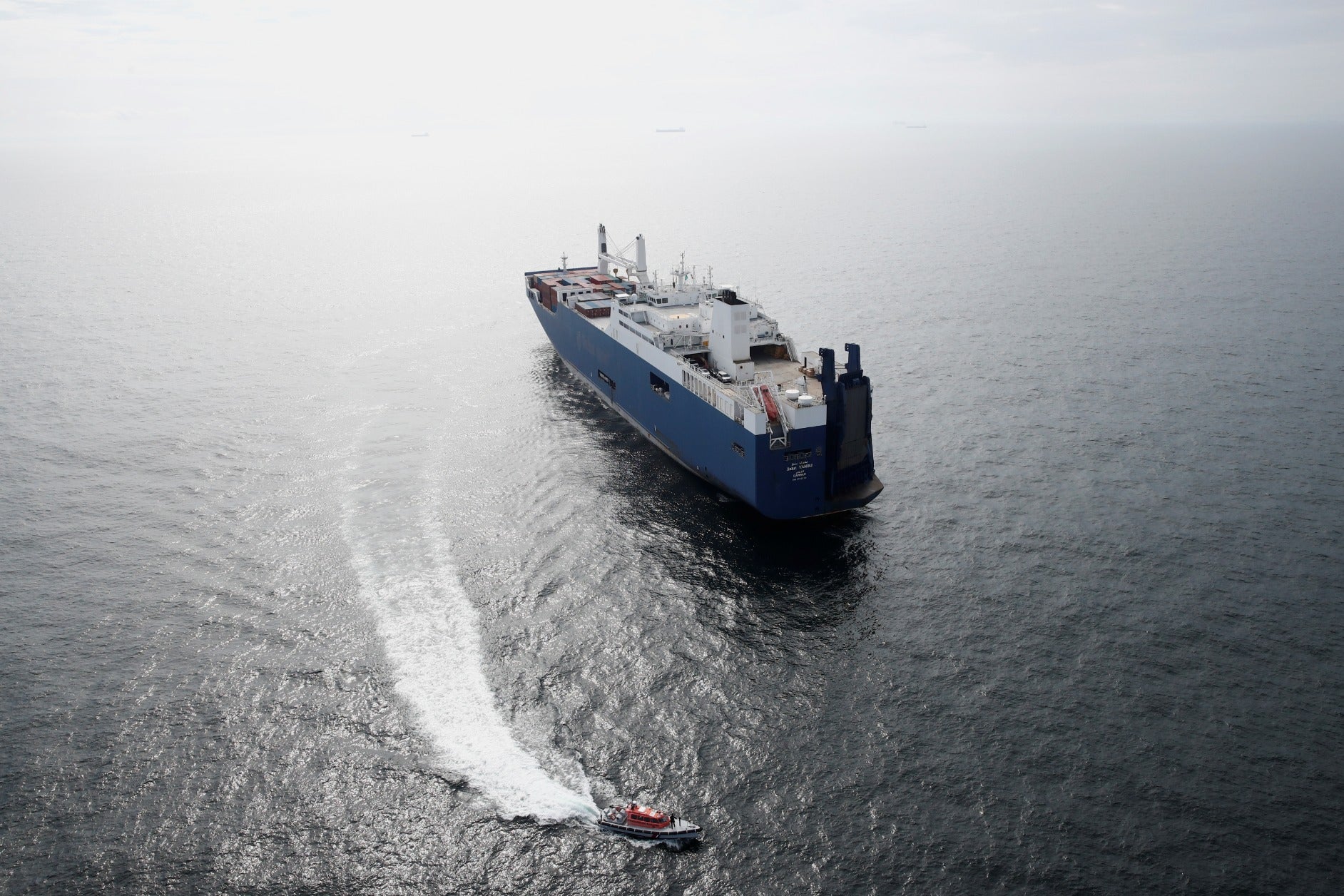 French human rights activists wave flags as they demonstrate in front of Saudi cargo ship Bahri Tabuk docked at le "Grand Port Autonome de Marseille" GPAM in Port-Saint-Louis-du-Rhone, on May 29, 2019.