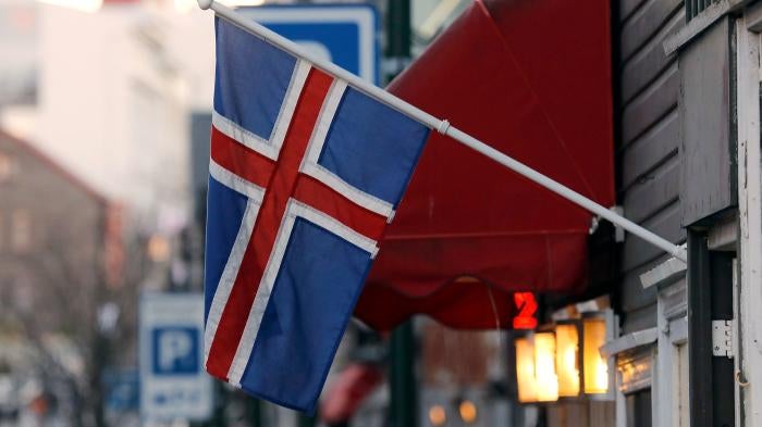 An Icelandic flag hangs outside a shop in Reykjavik, October 27, 2016.