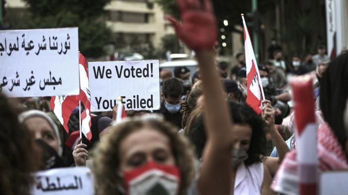 Activists chant slogans demanding the end of corruption