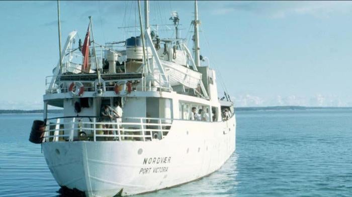 An archival photo of a boat at sea