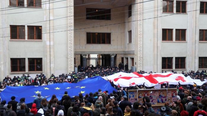 People take part in a protest against the controversial "foreign agents" bill outside the parliament building in Tbilisi, Georgia March 6, 2023.