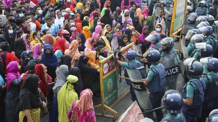 Police confront garment industry workers on the streets as they protest for a wage increase, Mirpur, Dhaka, Bangladesh, November 12, 2023.