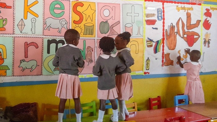 4 girls in a school classroom 