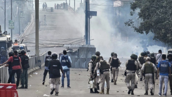 Police fire tear gas shells to disperse students protesting against ethnic violence in Imphal, in India's northeastern state of Manipur, September 10, 2024.