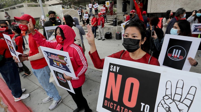 Members of the Burmese-American community demonstrate outside the Consulate General of Myanmar in Los Angeles, April 24, 2021.