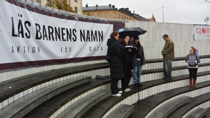 Demonstrators in Stockholm, Sweden read the names of the children killed in Gaza since October 7, 2023. 