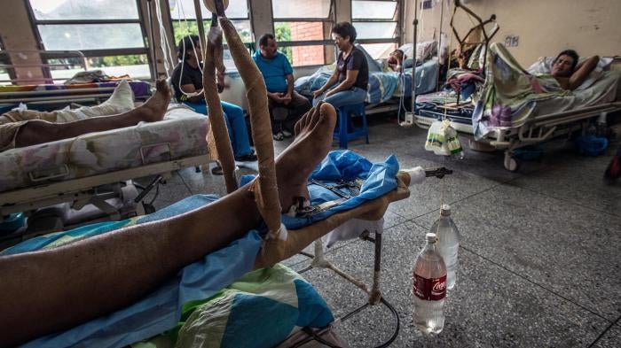Devices pieced together by doctors, using recycled soda bottles and water jugs as weights, to treat patients with broken legs at the University Hospital Dr. Luis Razetti in Barcelona, April 15, 2016. 