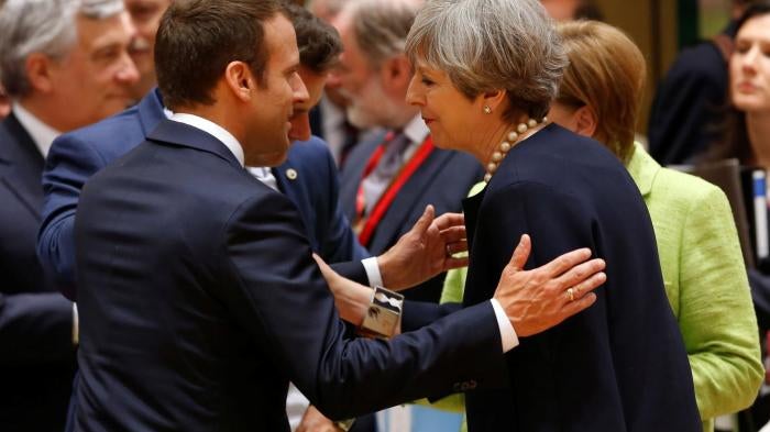 British Prime Minister Theresa May and French President Emmanuel Macron attend the EU summit in Brussels, Belgium, June 22, 2017.