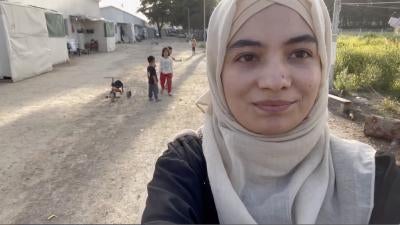 Photo of Parwana, 16, who lives in a refugee camp.