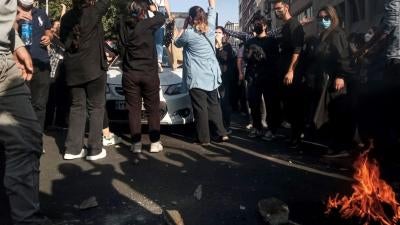 Iranian women on October 1, 2022, protest the death of Mahsa (Jina) Amini after she was detained by the morality police, in Tehran.