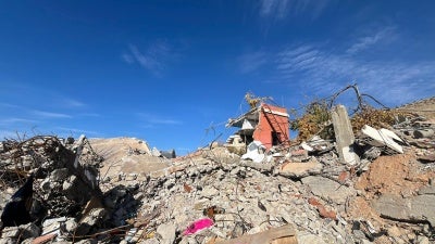 The remnants of a destroyed a two-story building after an Israeli strike on November 1, 2024, in the al-Salah neighborhood in Younine, Lebanon. 