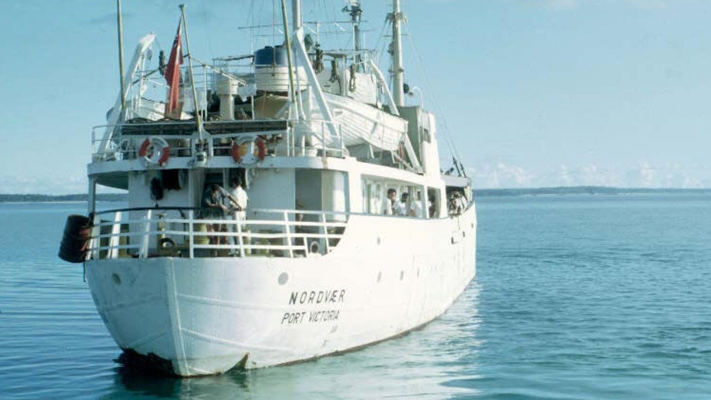 An archival photo of a boat at sea
