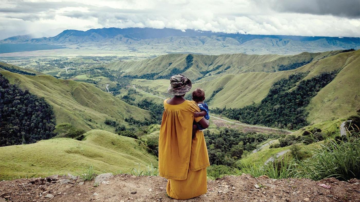 woman holding a child