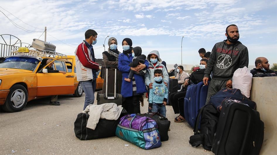 Palestinians wait to cross into Egypt at the Rafah crossing between Egypt and Gaza Strip in November 2020. Israeli and Egyptian authorities tightened their closure of Gaza amid the Covid-19 pandemic.