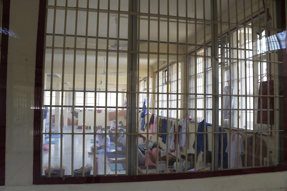 In this photo released by the Department of Corrections, COVID-19 prisoners sit inside a field hospital set up at the Medical Correctional Institution to treat COVID-19 inmates in Bangkok, Thailand on May 8, 2021.
