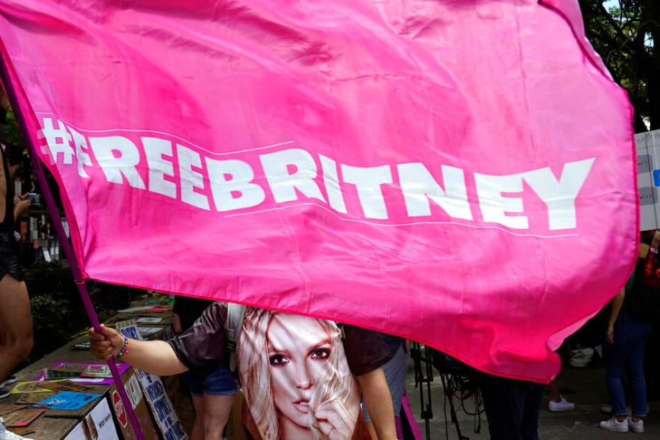 A "Free Britney" sign shows support for popstar Britney Spears who had a scheduled hearing in her conservatorship case at the County Courthouse in Los Angeles, June 23, 2021.