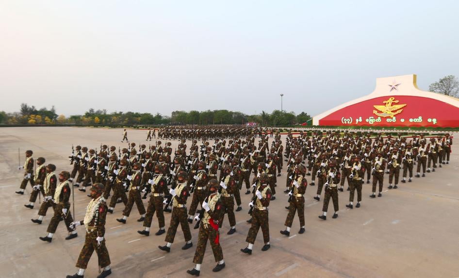 Myanmar military officers march during a parade