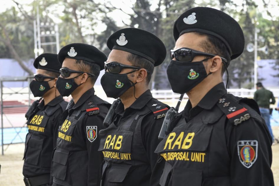 Bangladeshi RAB (Rapid Action Battalion) stand on guard at the Central Shaheed Minar in Dhaka, Bangladesh.