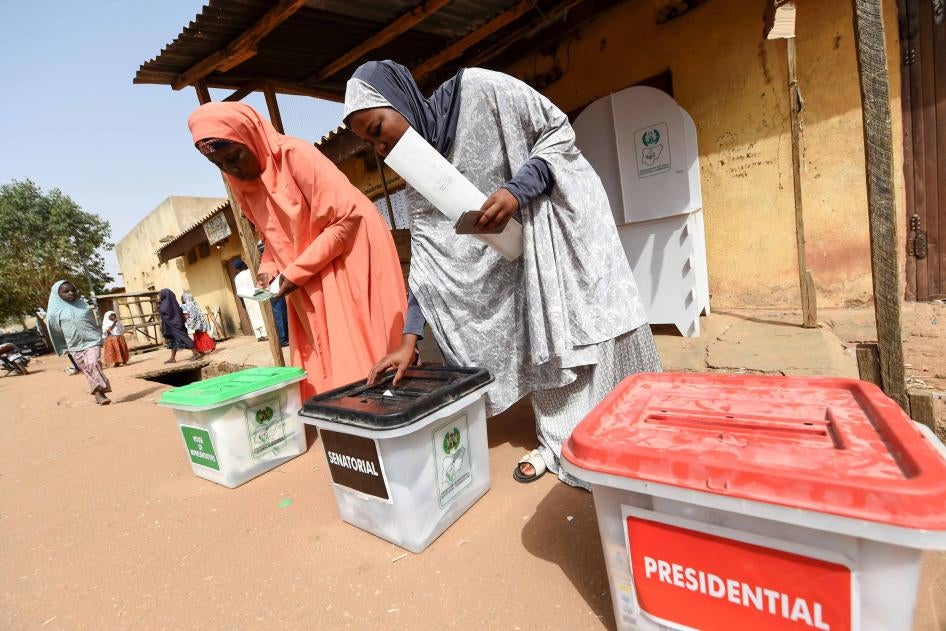 Women cast their ballots as they vote in the presidential and parliamentary elections on February 23, 2019, at a polling station in Daura, Katsina State, northwest Nigeria. 