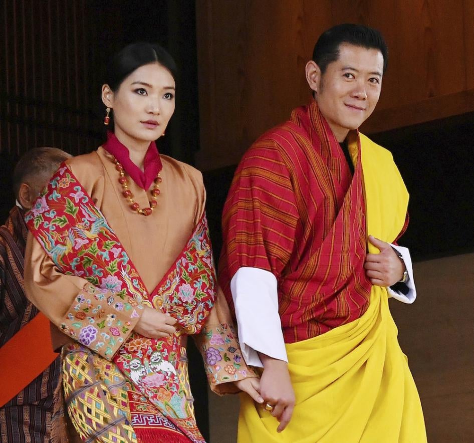 The king of Bhutan, Jigme Khesar Namgyel Wangchuck, and his wife attend the enthronement ceremony at the Imperial Palace in Tokyo.