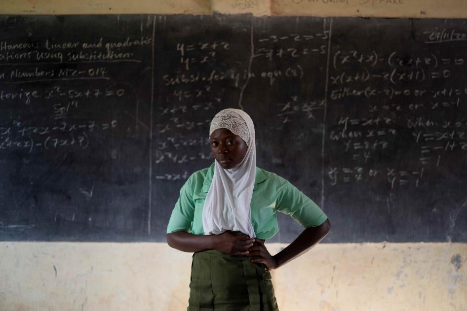 A student poses for a portrait in the classroom of her school in Koidu, Kono district, Sierra Leone, on November 24, 2020. 