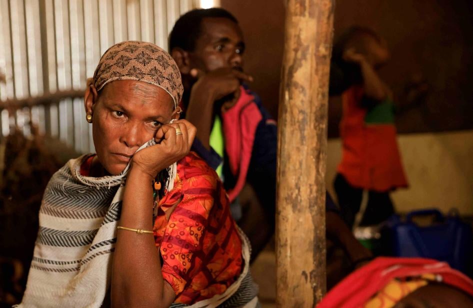 A woman displaced due to the conflict in northern Ethiopia sits in front of her shelter at camp for internally displaced people in Abi Adi, Tigray, June 24, 2023. A woman displaced due to the conflict in northern Ethiopia sits in front of her shelter at camp for internally displaced people in Abi Adi, Tigray, June 24, 2023. (c) 2023 Tiksa Negeri/Reuters 2023 Tiksa Negeri/Reuters