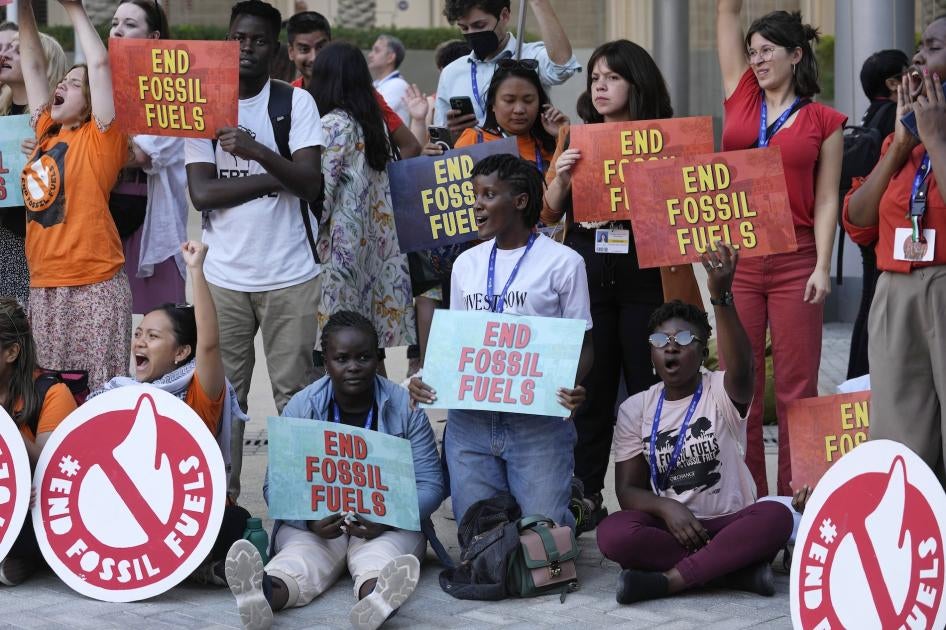 Vanessa Nakate, of Uganda, center, takes part in a protest against fossil fuels at the COP28 U.N. Climate Summit in Dubai, United Arab Emirates, December 5, 2023. 