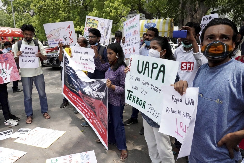 Activists demand justice for 84-year-old Father Stan Swamy, the Indian Jesuit priest and tribal rights activist, who had passed away earlier that month in New Delhi, July 23, 2021.