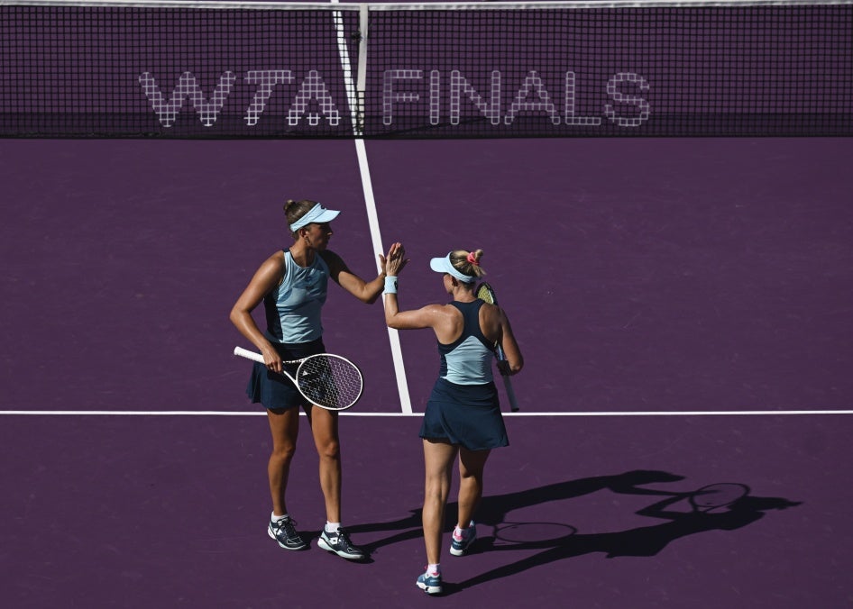Storm Hunter of Australia and Elise Mertens of Belgium during a match during the GNP Seguros Women's Tennis Association Finals in Cancun, Mexico, October 30, 2023. 