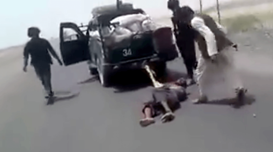 Screenshot of a video apparently showing Afghan police in Kandahar abusing a detainee.
